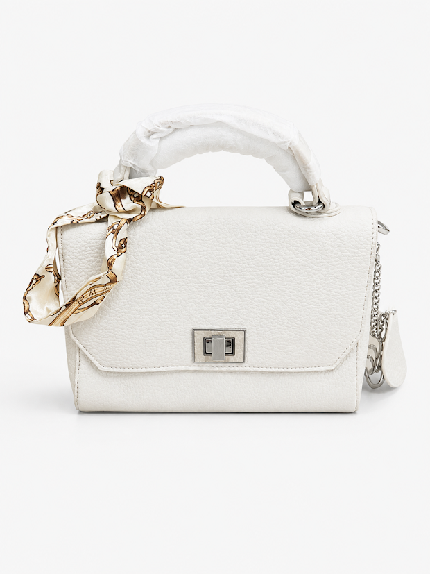 white sling bag with satin ribbon