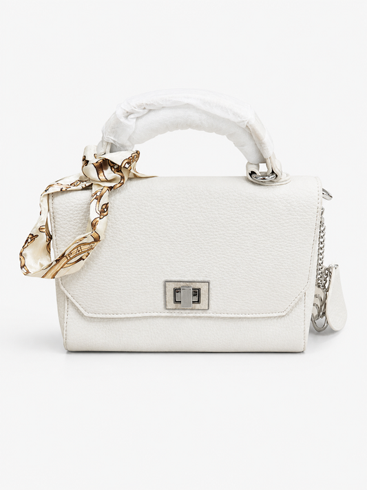 white sling bag with satin ribbon
