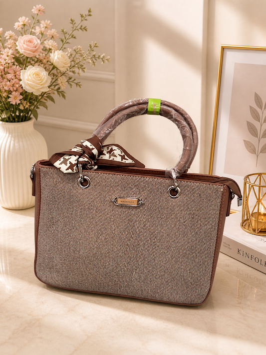 beautiful handbag with a satin ribbon