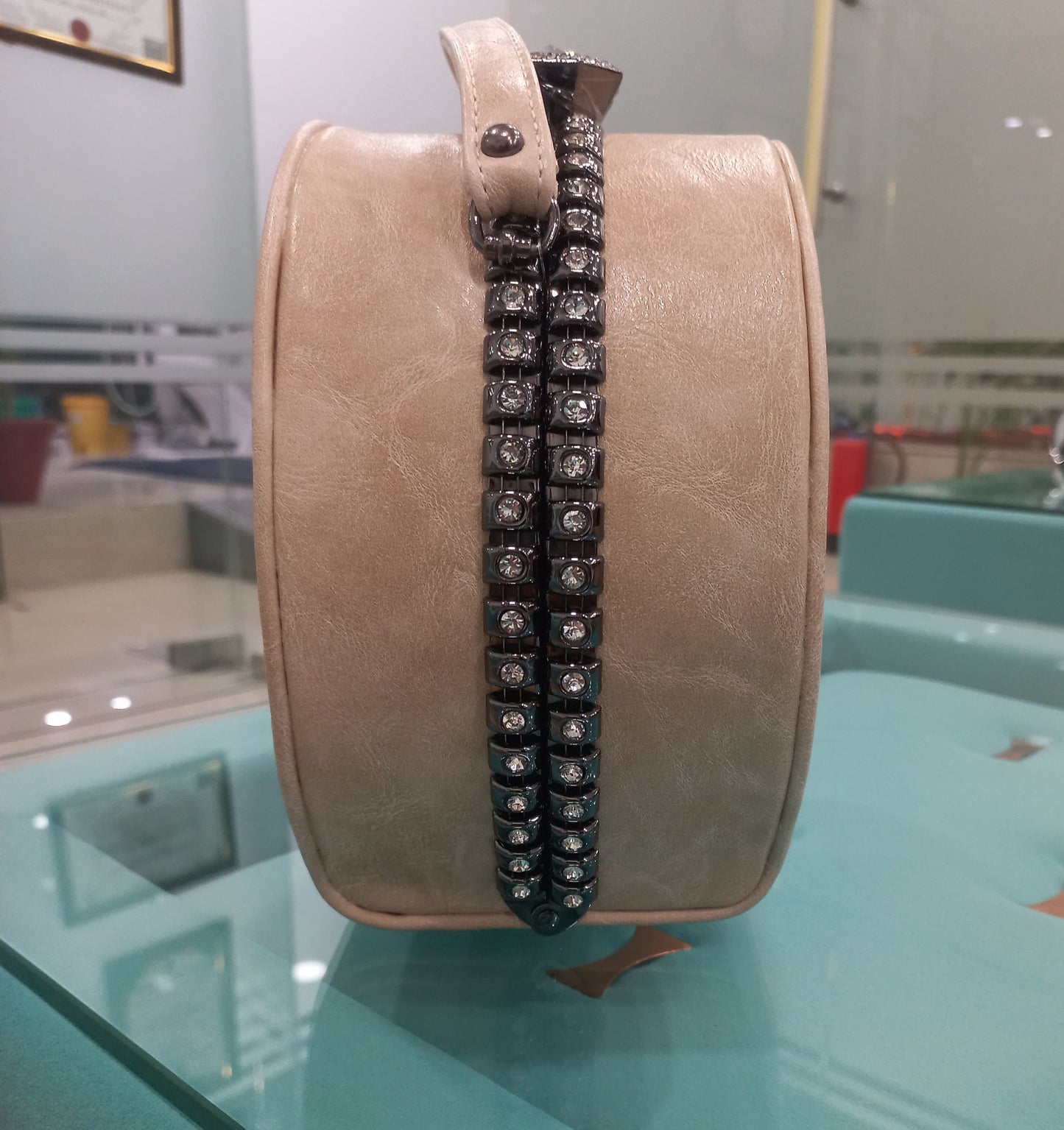 Round beige colored bag