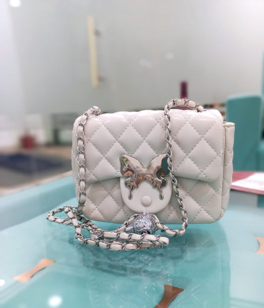 White handbag with butterfly design